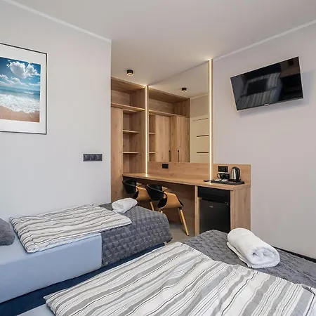 Quarto em Acomodações Particulares Meduza Łeba